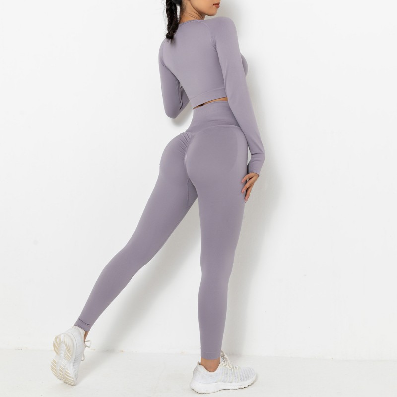 Spot Europe and the United States new seamless knitting peach pure color hip long-sleeved yoga suit sports running fitness clothes women